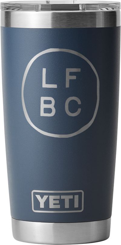 A blue YETI tumbler with a silver rim and base. The letters “LFBC” are arranged inside a roughly drawn circle above the YETI logo on the front.